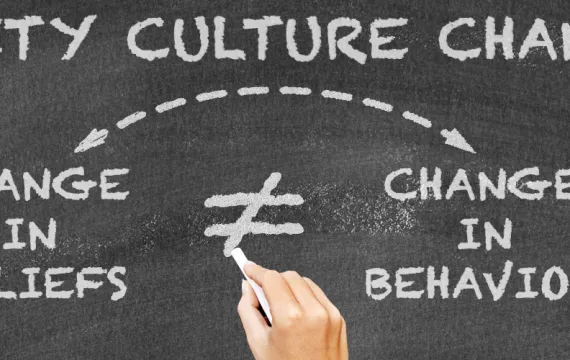 Hand Writing on Chalkboard Safety Culture Change