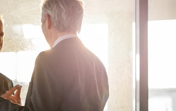Two businessmen talking