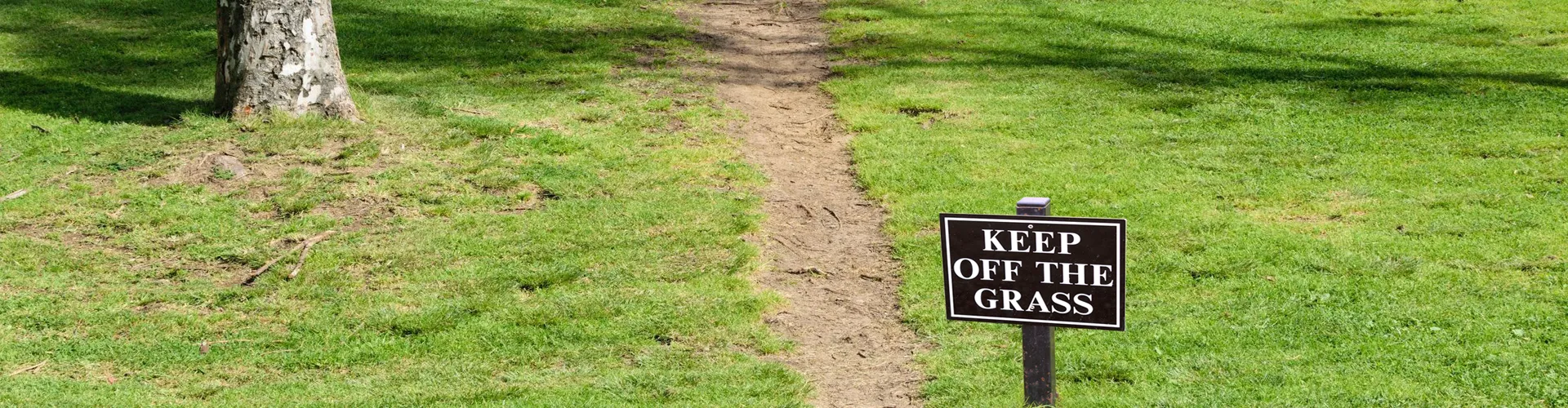 Foot Path with Keep Off Grass Sign