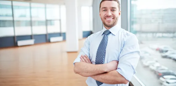 businessman smiling at camera
